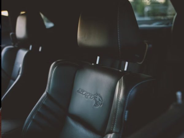 Odour removal on carpet and car seat upholstery